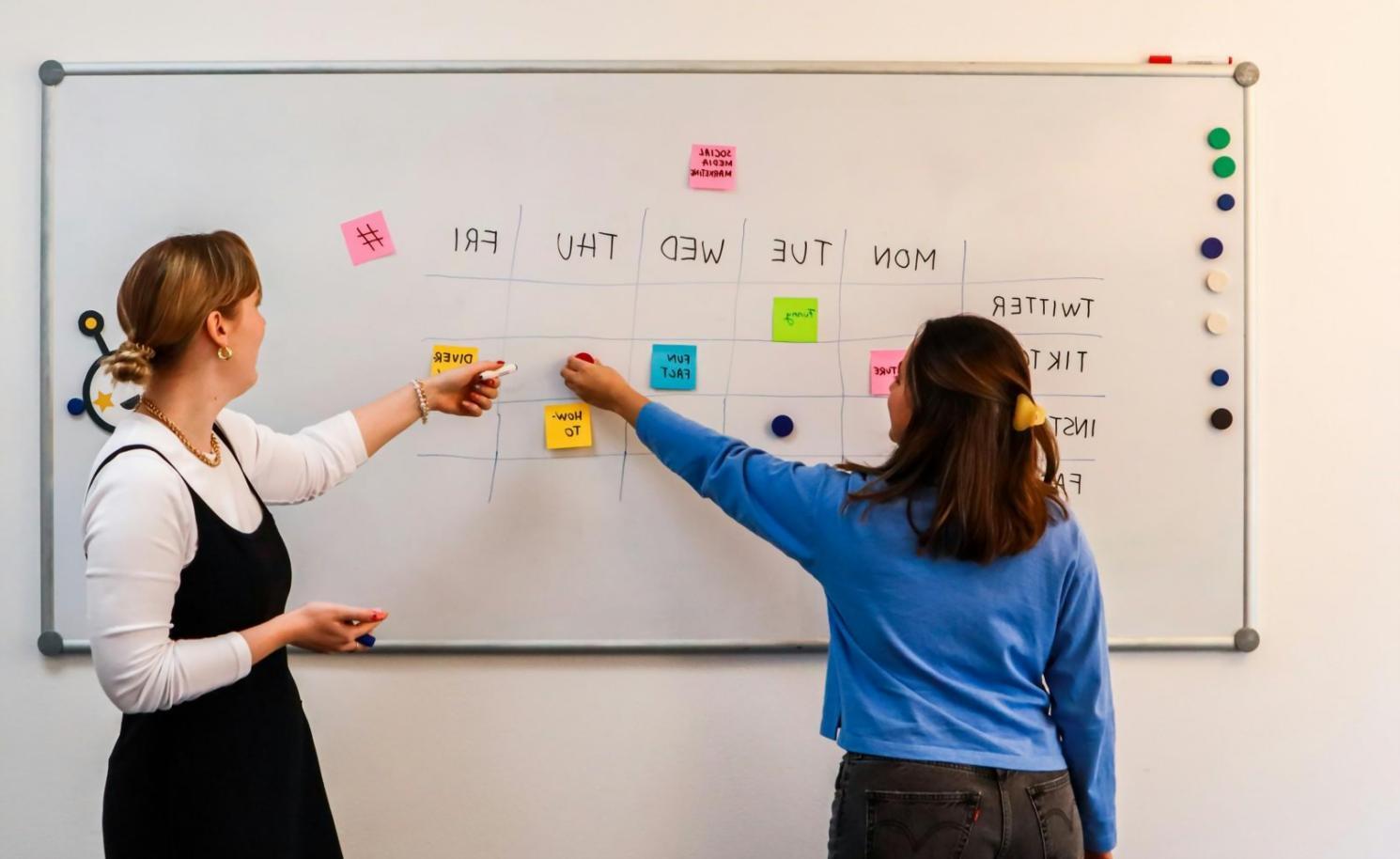 Workshop participants collaborating on budget consolidation strategies